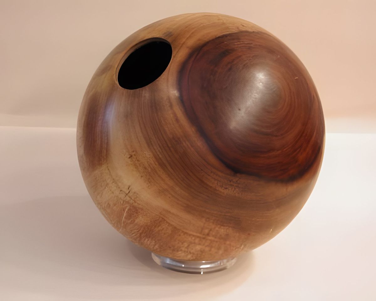 Using my router jig I made a perfect sphere and hollowed it out.