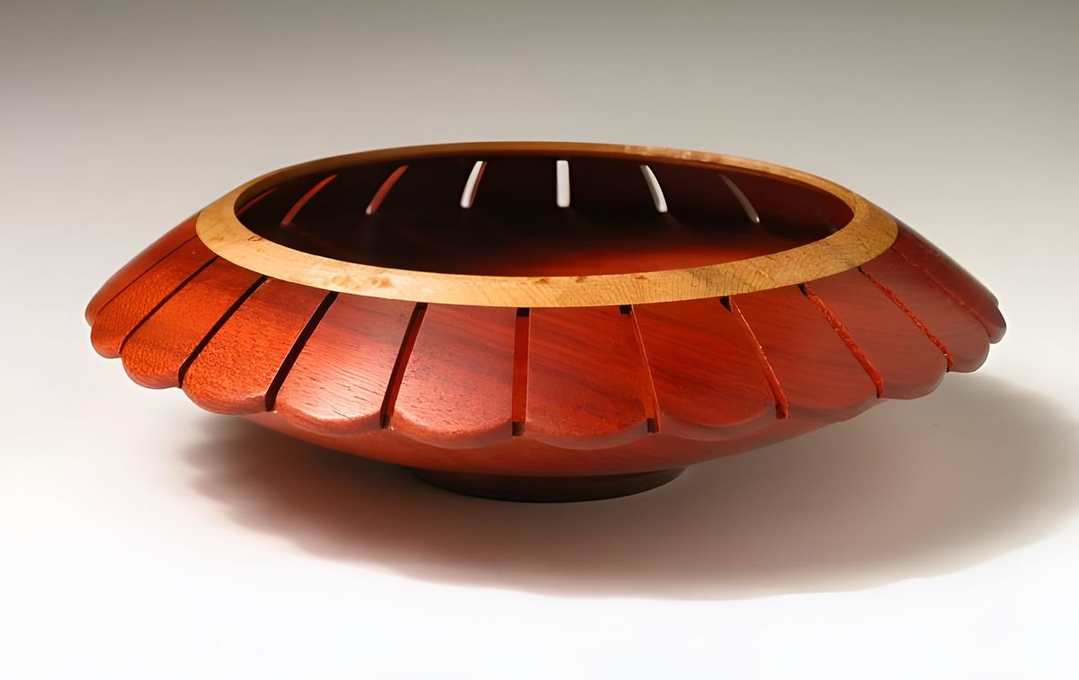 Bloodwood and maple. I have recently been rounding the petals.