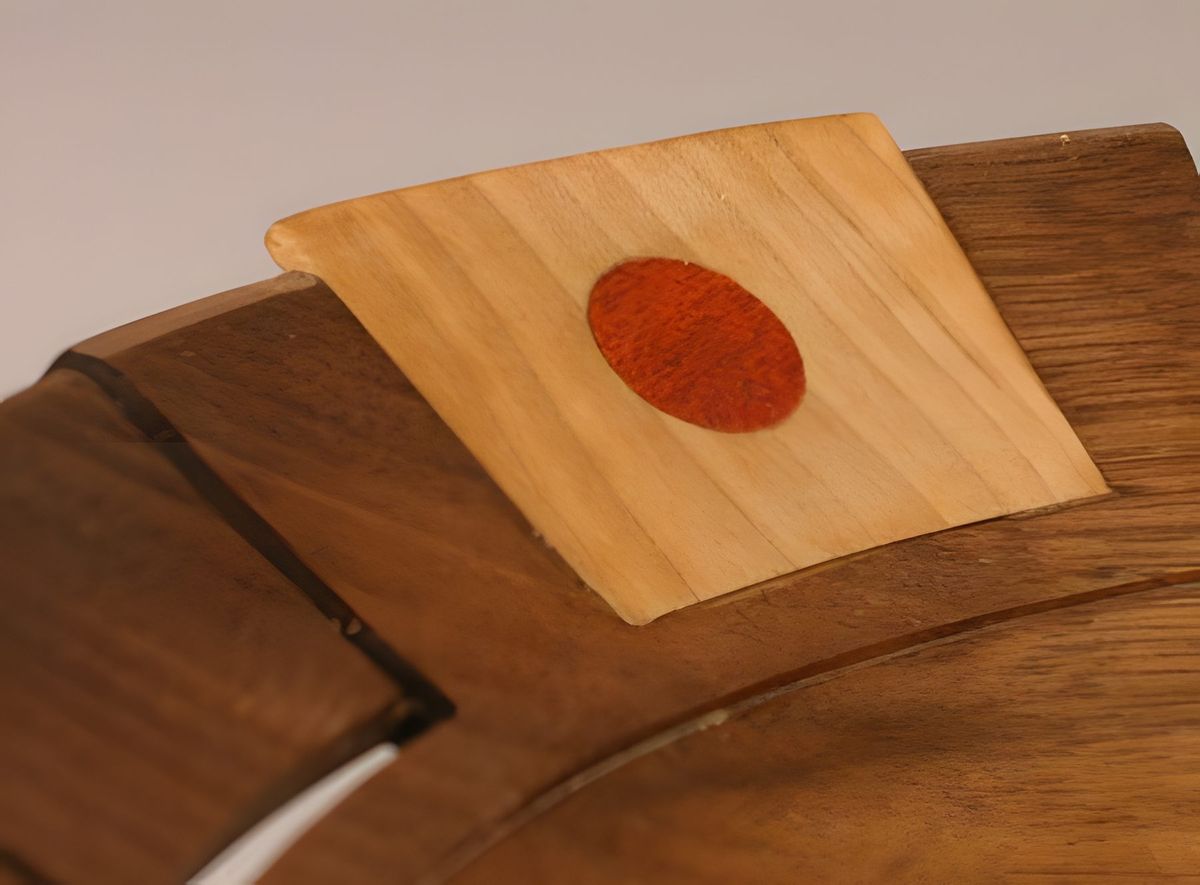 The insert required compound cuts and flexing the maple.