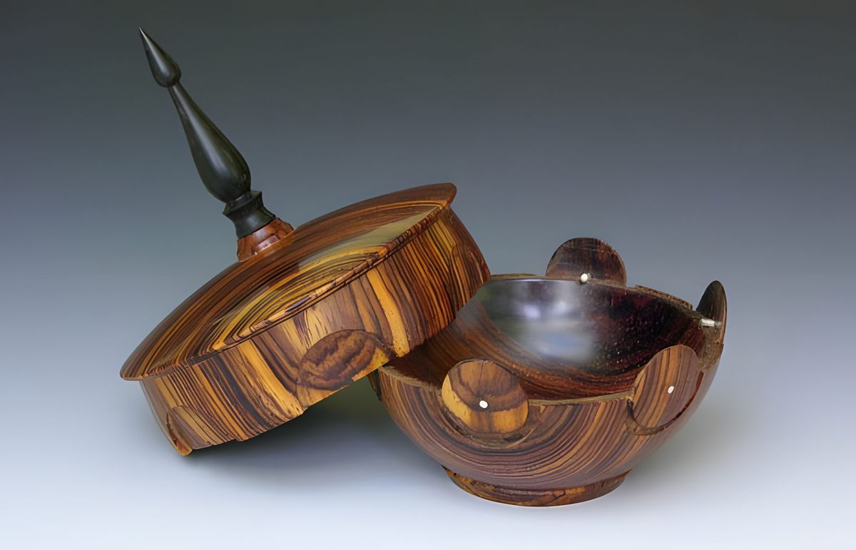 It is made from cocobolo, ebony and silver.