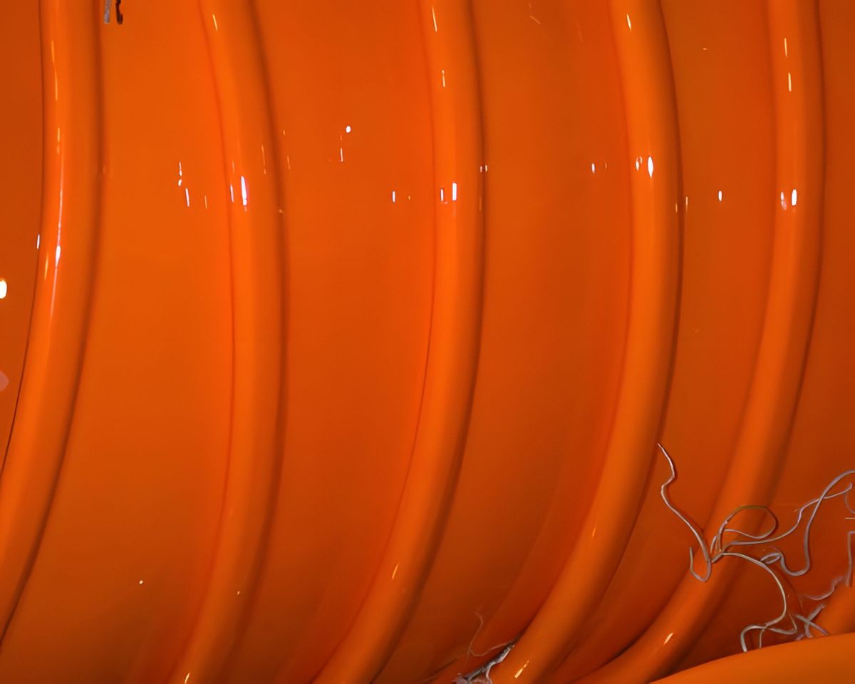 This is a stack of orange bowls.