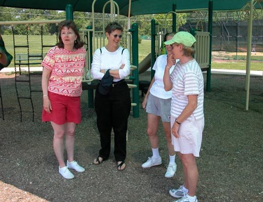 Nancy, Fiona, Julia and Trish wait in the shade for the action to begin.